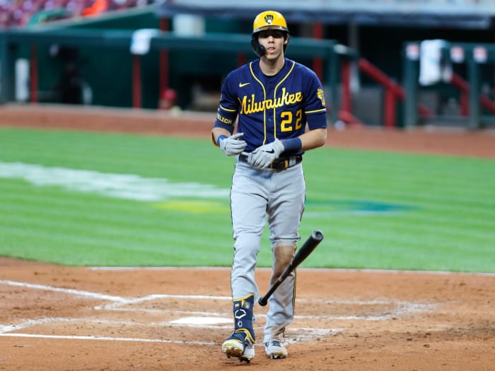 Christian Yelich tosses bat